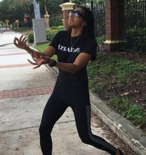 a man standing on the side of a street