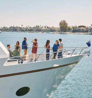 a group of people on a boat in the water