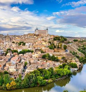 an aerial view of a city with a river