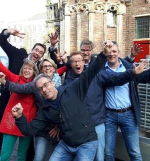 a group of people posing for a picture