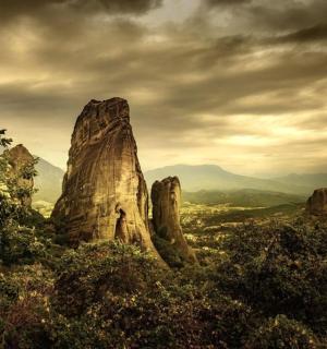 a view of a group of tall rock formations