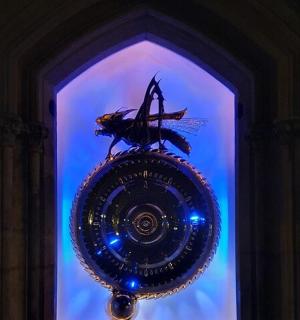 a glass object with a dragon on top of it