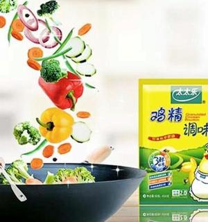 a bowl of vegetables and a box of chicken noodle soup