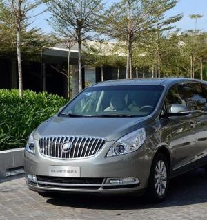 a silver car parked in a parking lot
