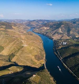 an aerial view of a river in a valley