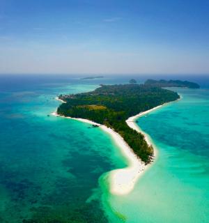 an aerial view of an island in the ocean