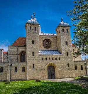 a large stone building with a tower on top