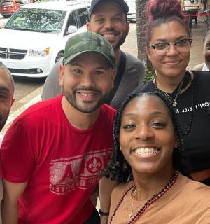 a group of people posing for a picture