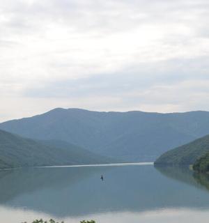 a view of a lake with mountains in the background