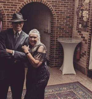 a man and a woman posing for a picture