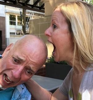 a woman is standing next to a man