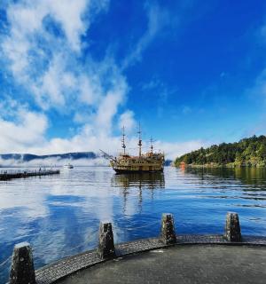 a boat in the water near a dock