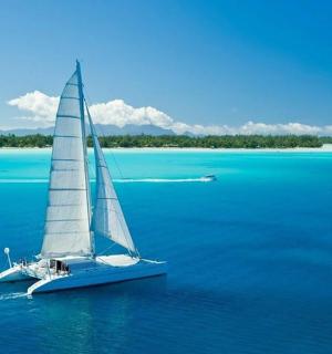 a sailboat in the middle of a large body of water