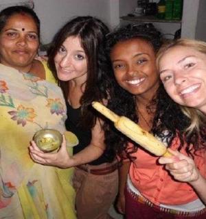 a group of three women posing for a picture