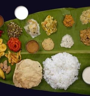 a green leaf with different types of food on it