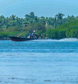 a boat in the middle of a large body of water