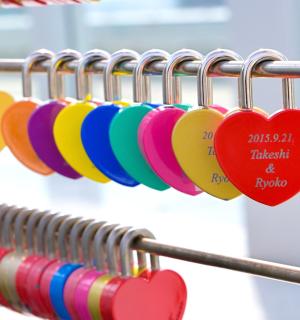 a row of hearts hanging on a rack