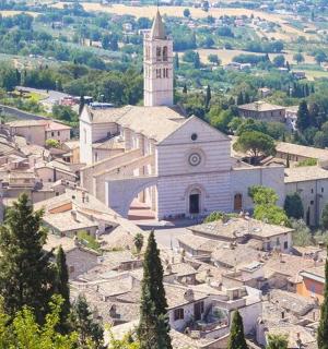 an aerial view of a village with a church