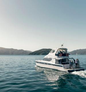 a boat in the water with people on it