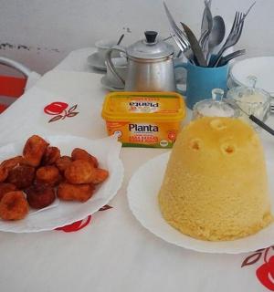 a table with a plate of food and a plate of food gmaxwell gmaxwell