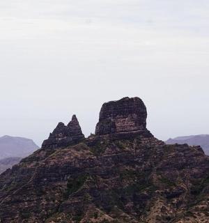a mountain with rocks on top of it