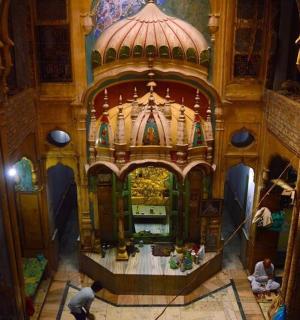 an overhead view of a building with people in it