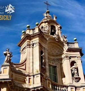 a building with a cross on top of it