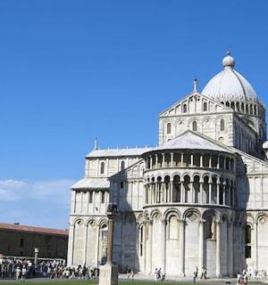 two towers of a building next to a cathedral