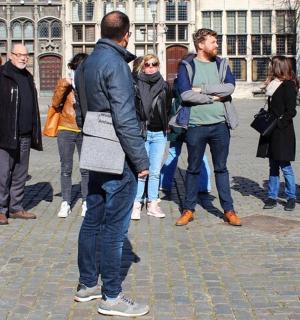 a group of people standing on a street