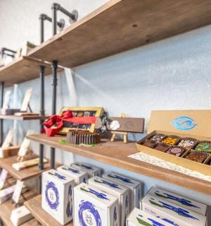 a store with shelves of pastries and boxes on them
