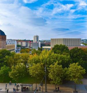 a view of a city with buildings and trees