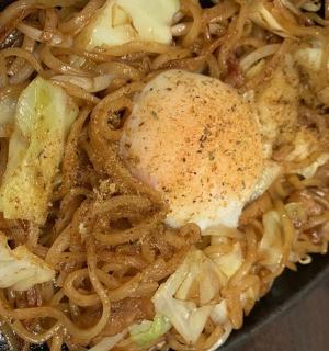 a plate of food with noodles and meat