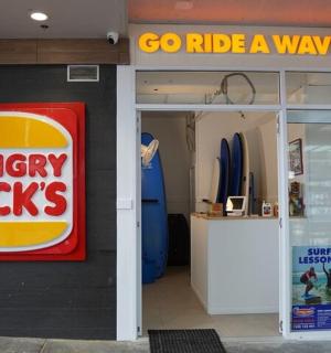 a shop with a sign that reads hungry jackprises