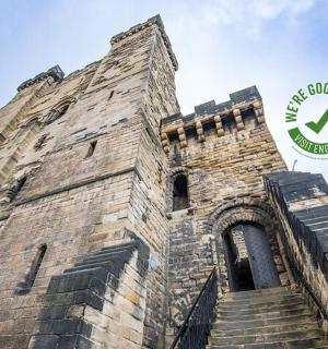 a brick building with a sign on the side of it