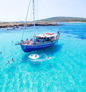 a group of people on a boat in the water