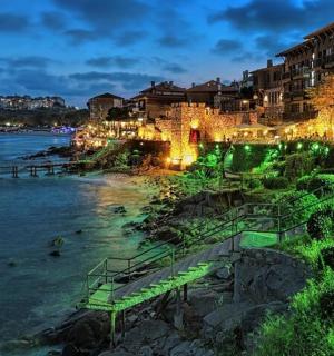 a view of a city with a river and buildings