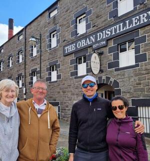 a group of people standing in front of a building