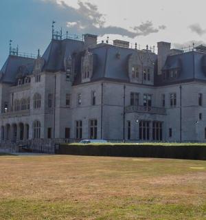 a large white house with a roof