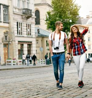 a man and a woman walking down a street