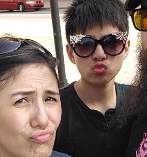 a woman and a man posing for a picture