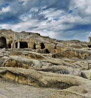 a building on top of a rocky mountain