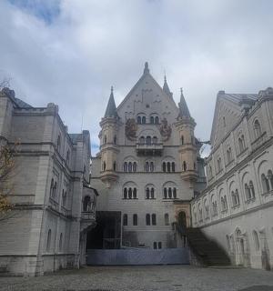 a large building with a staircase in front of it
