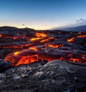 a view of a lava field at night