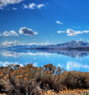 a view of a lake with a mountain in the background