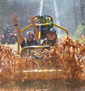a group of people riding on a roller coaster