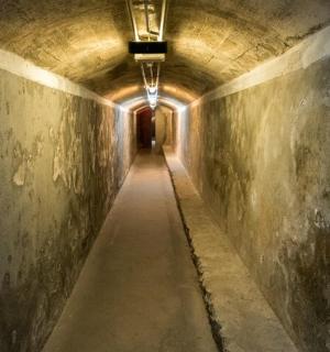 a tunnel with a light at the end of it