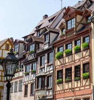 a row of houses in a city with a street light