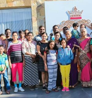 a large group of people posing for a picture