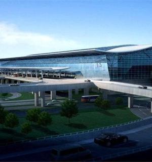 a large building with a road in front of it