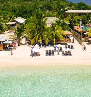 an aerial view of a resort on a beach
